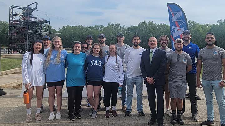 HERCules student team members pose with UAH President, Dr. Charles L. Karr