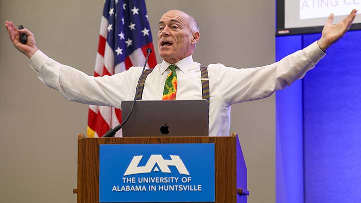 James Spann speaking at podium.