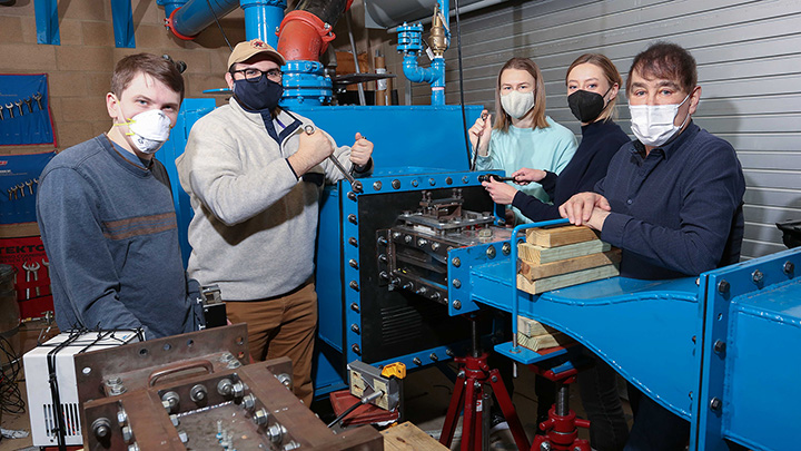 group photo in the Supersonic Wind Tunnel Lab at UAH