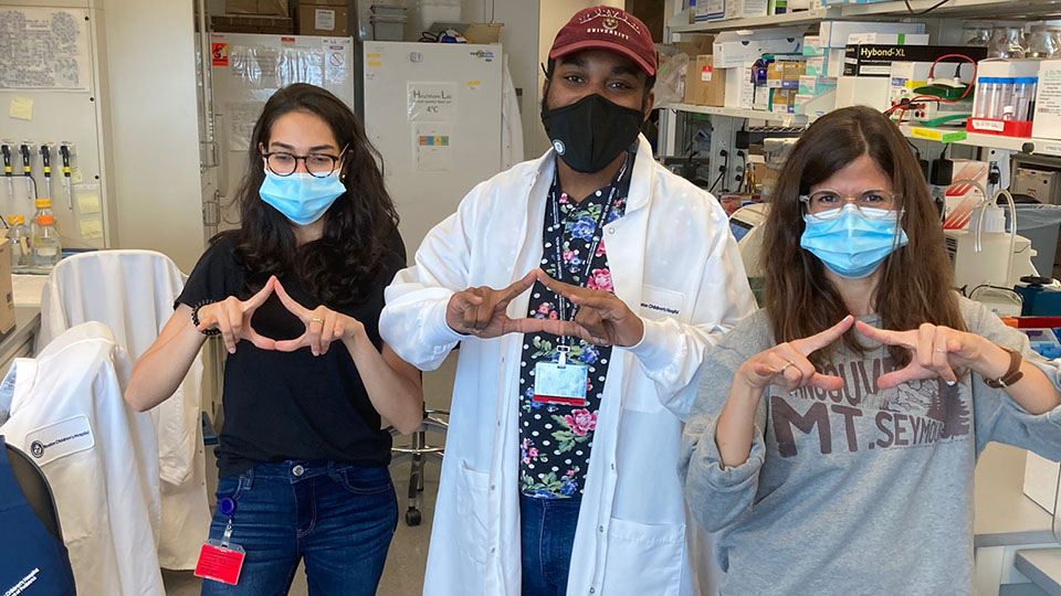 photo of Sidney Martin and colleagues in a science lab