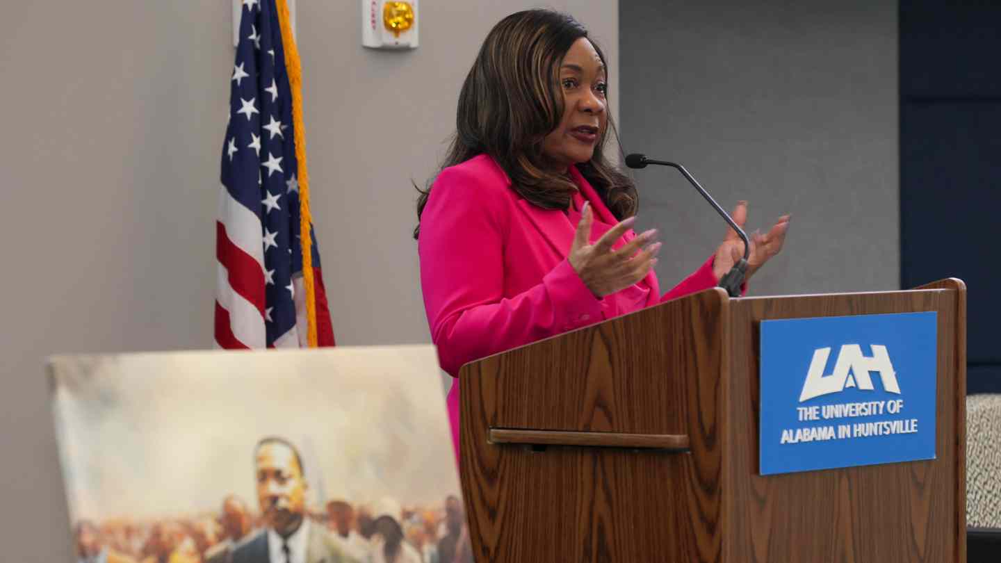 Catherine Coleman Flowers speaking at podium.