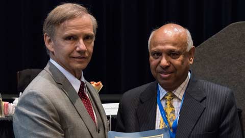 UAH business professor recognized with prestigious distinguished service award
