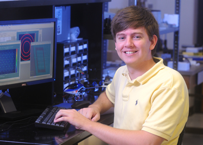 Josh Walters sitting at a computer