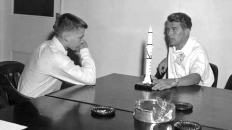 Seventeen-year-old Jimmy Blackmon discusses rocketry with Dr. Wernher von Braun at Redstone Arsenal