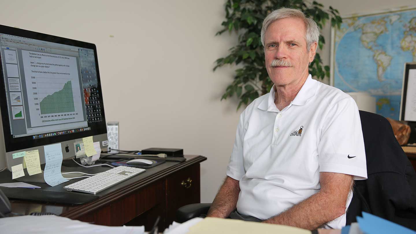 John Christy setting in his office