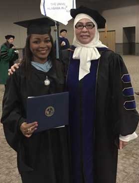 Traneshia Stoudemire standing with Dr. Hamsa Mahafza