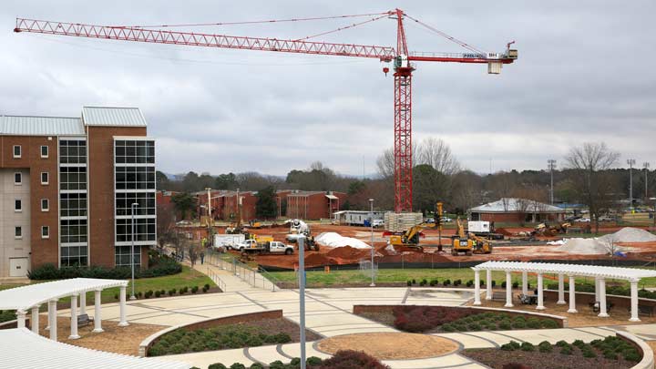 construction crane over charger village ?>