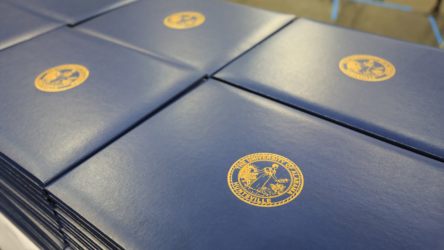 Stack of UAH diplomas