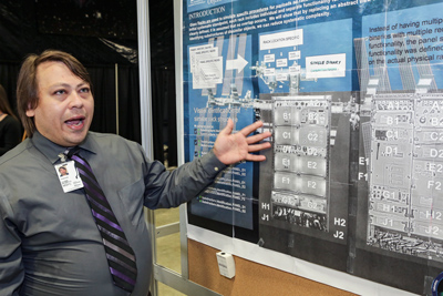 UAH students who graduated from the Marshall Space Flight Center’s summer internship program presented their project posters and abstracts on Wednesday, Aug. 9. From top are Jaewon Choi, physics, mathematics, optics; Chris Hill, mechanical engineering; Markus Murdy, aerospace engineering; Glenn Scott Nesbitt II, aerospace engineering; and Maria Emma Torres, chemistry/biology.