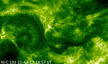 Courtesy NASA
    These photos of the solar corona, or million-degree outer atmosphere, show the improvement in resolution offered by NASA's High Resolution Coronal Imager, or Hi-C (bottom), versus the Atmospheric Imaging Assembly on NASA's Solar Dynamics Observatory (top). Both images show a portion of the sun's surface roughly 85,000 by 50,000 miles in size. Hi-C launched on a sounding rocket on July 11, 2012, in a flight that lasted about 10 minutes. The representative-color images were made from observations of ultraviolet light at a wavelength of 19.3 nanometers (25 times shorter than the wavelength of visible light).