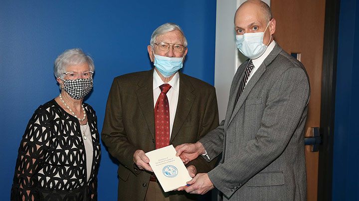 Photo of Gerry and Virgil Schaffer with UAH President Darren Dawson. ?>