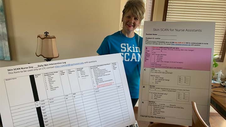 Dr. Rummel and presentational materials for Skin SCAN.