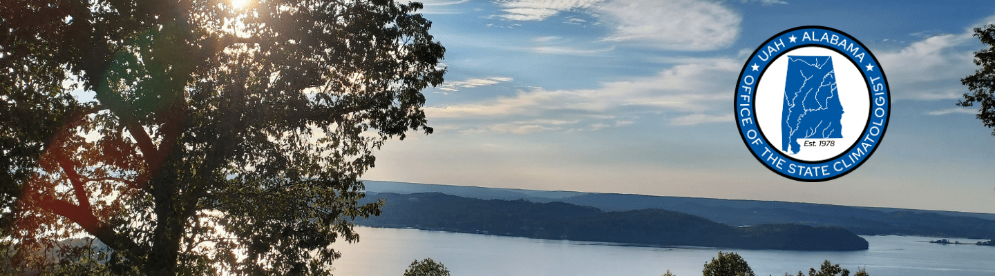 Sunlight shines through a tree that overlooks a winding Tennessee River. The image is overlayed with the Alabama Office of the State Climatologist seal.